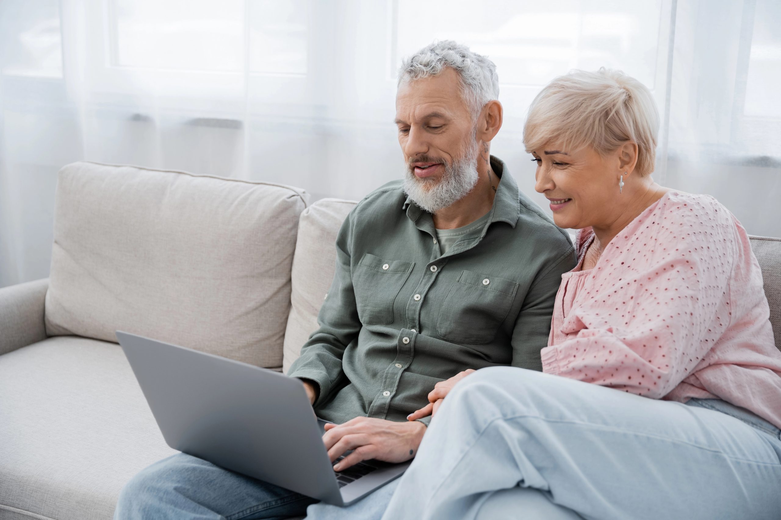 Couple reading newsletter